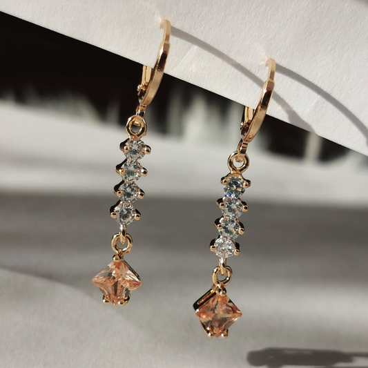 Universe party oorbellen met vierkante steentjes